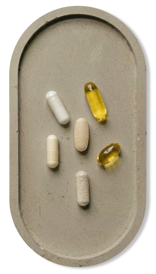 Assorted Bonpharm pills on a textured surface
